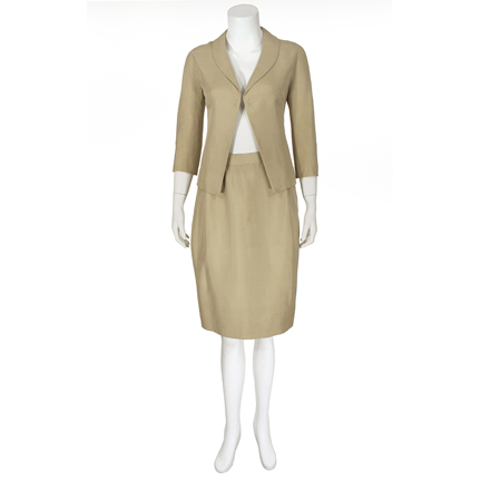 SYLVIA  Sylvia West (Caroll Baker)  Two-piece skirt suit by Edith Head