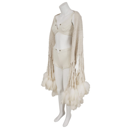 RIHANNA  Vintage bathing suit and feathered shawl worn in Only Girl (In The World)